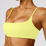 Comper Women's Sports Bra with Thin Straps Stretchy Wirefree Workout Bras Lightweight Workouts Bralette with Removable Pads (Yellow-S)