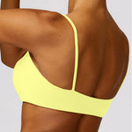 Comper Women's Sports Bra with Thin Straps Stretchy Wirefree Workout Bras Lightweight Workouts Bralette with Removable Pads (Yellow-S)