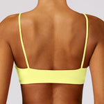 Comper Women's Sports Bra with Thin Straps Stretchy Wirefree Workout Bras Lightweight Workouts Bralette with Removable Pads (Yellow-S)