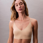 Calvin Klein Invisibles Comfort Lightly Lined Seamless Wireless Triangle Bralette Bra, Bare, Medium
