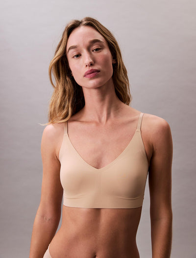 Calvin Klein Invisibles Comfort Lightly Lined Seamless Wireless Triangle Bralette Bra, Bare, Medium